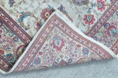 Lot 393 - An antique Kashan rug