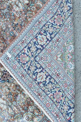 Lot 394 - A silk Kashan carpet