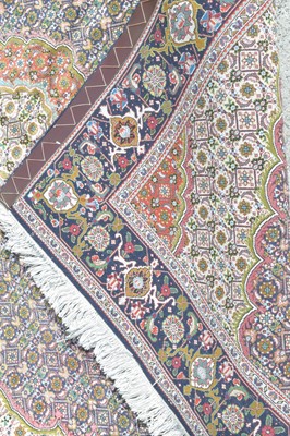 Lot 428 - A Tabriz rug