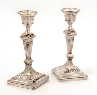 Lot 159 - A pair of George V silver candlesticks