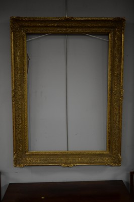 Lot 134 - A group of four early 20th Century gilt swept picture frames