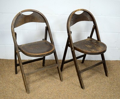 Lot 69 - A pair of 1940's plywood folding chairs.