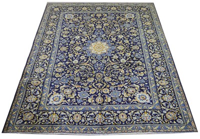 Lot 394 - A Kashan carpet