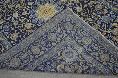 Lot 394 - A Kashan carpet