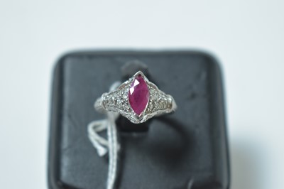 Lot 140A - A contemporary 14ct white gold, ruby and diamond cocktail ring