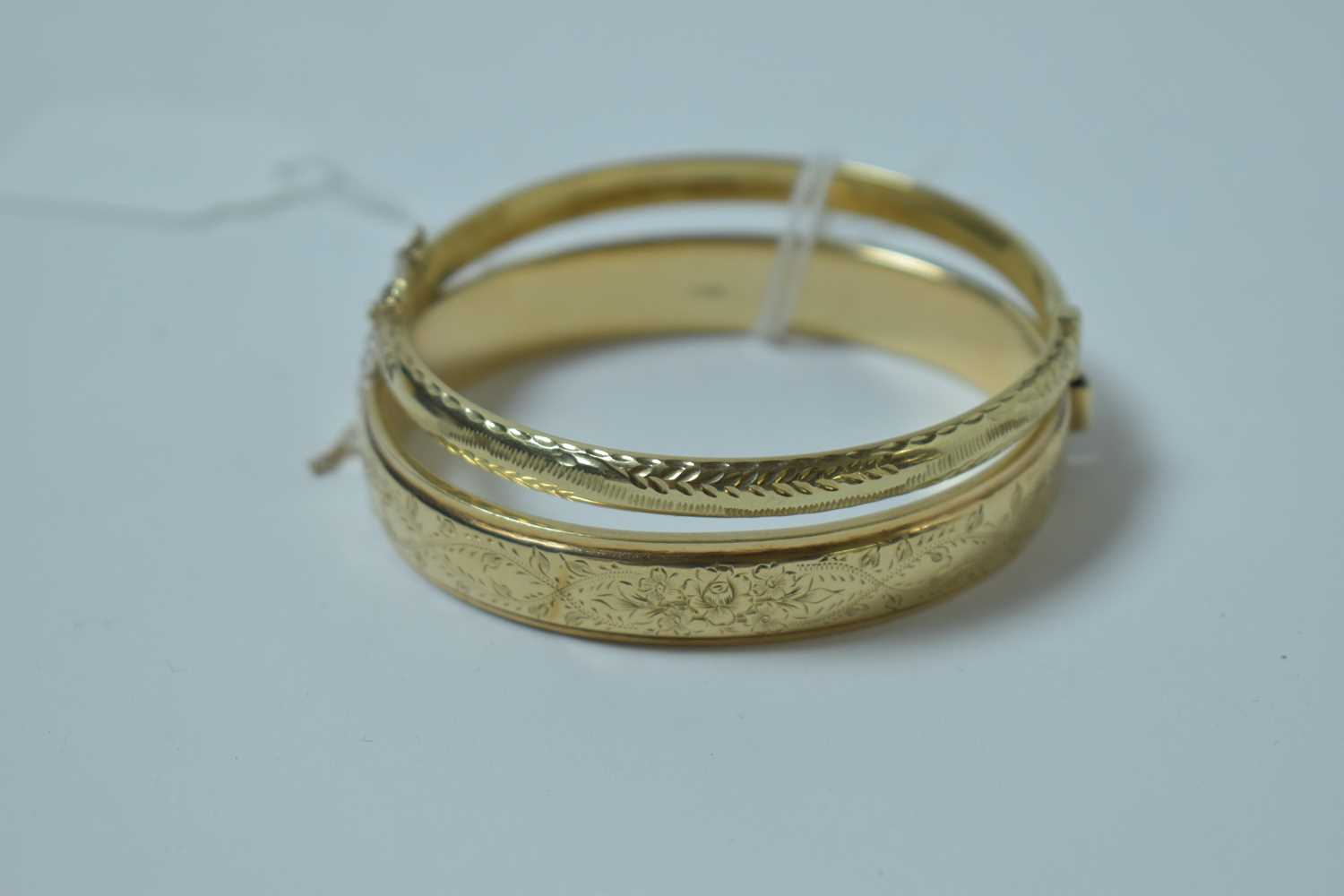 Lot 236 - Two 9ct yellow gold bangles