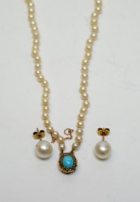Lot 159 - A cultured pearl two-strand necklace with diamond and turquoise clasp.