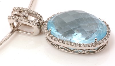 Lot 74 - A topaz and diamond pendant by RJM