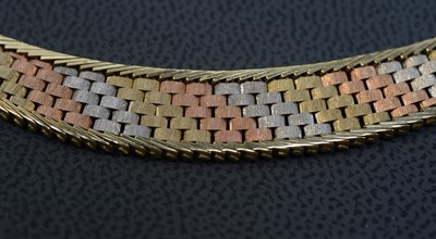 Lot 1 - A 9ct gold tri-coloured collar necklace.