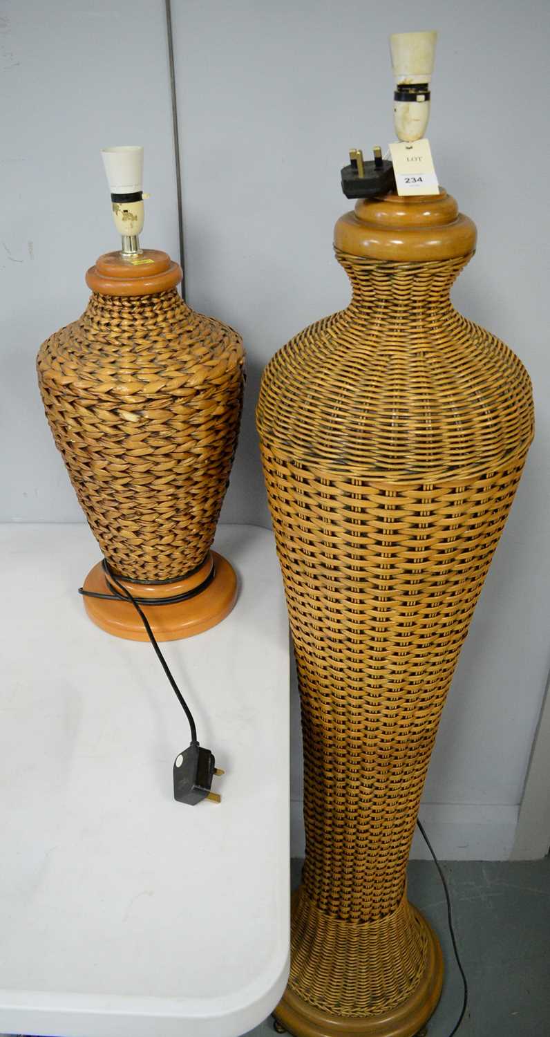 Lot 234 - 20th century rattan standard lamp and similar table lamp
