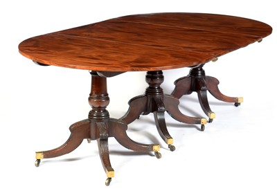Lot 666 - Early 20th Century mahogany triple pedestal dining table