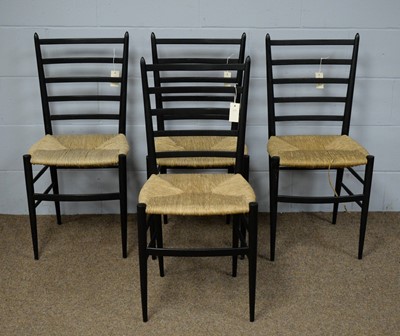 Lot 39 - A set of four dining chairs in the manner of Gio Ponti.