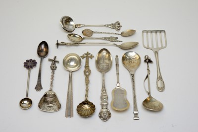 Lot 94 - A selection of British and continental silver spoons.