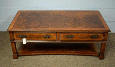 Lot 70 - A 20th Century burr yew wood coffee table.