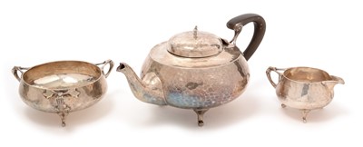 Lot 165 - Three piece silver Arts & Crafts tea service.