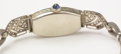 Lot 11 - A French Art Deco diamond and sapphire set cocktail watch