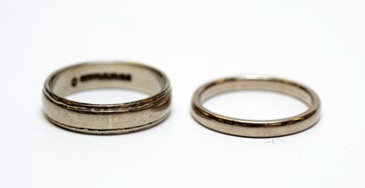 Lot 17 - Two 18ct white gold wedding bands.