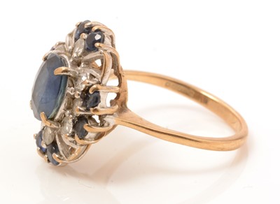Lot 77 - A sapphire and diamond dress ring