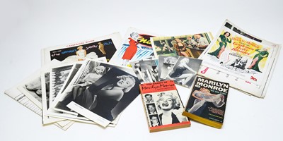 Lot 1306 - Selection of photographs, books, and ephemera relating to Marilyn Monroe