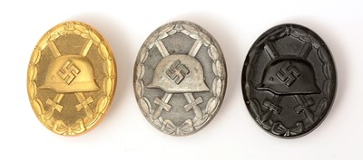 Lot 1114 - Three WWII Waffen-SS Wound Badges