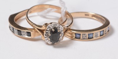 Lot 250 - Three sapphire and diamond rings.