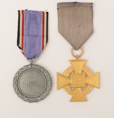 Lot 1120 - WWII German Air Defence medal, 1938 and a Faithful Service medal, first class