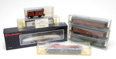 Lot 649 - Seven boxed Electrotren HO-gauge trains, carriages, and rolling stock.