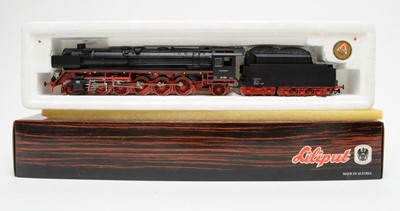 Lot 650 - Three boxed Liliput locomotives and rolling stock.