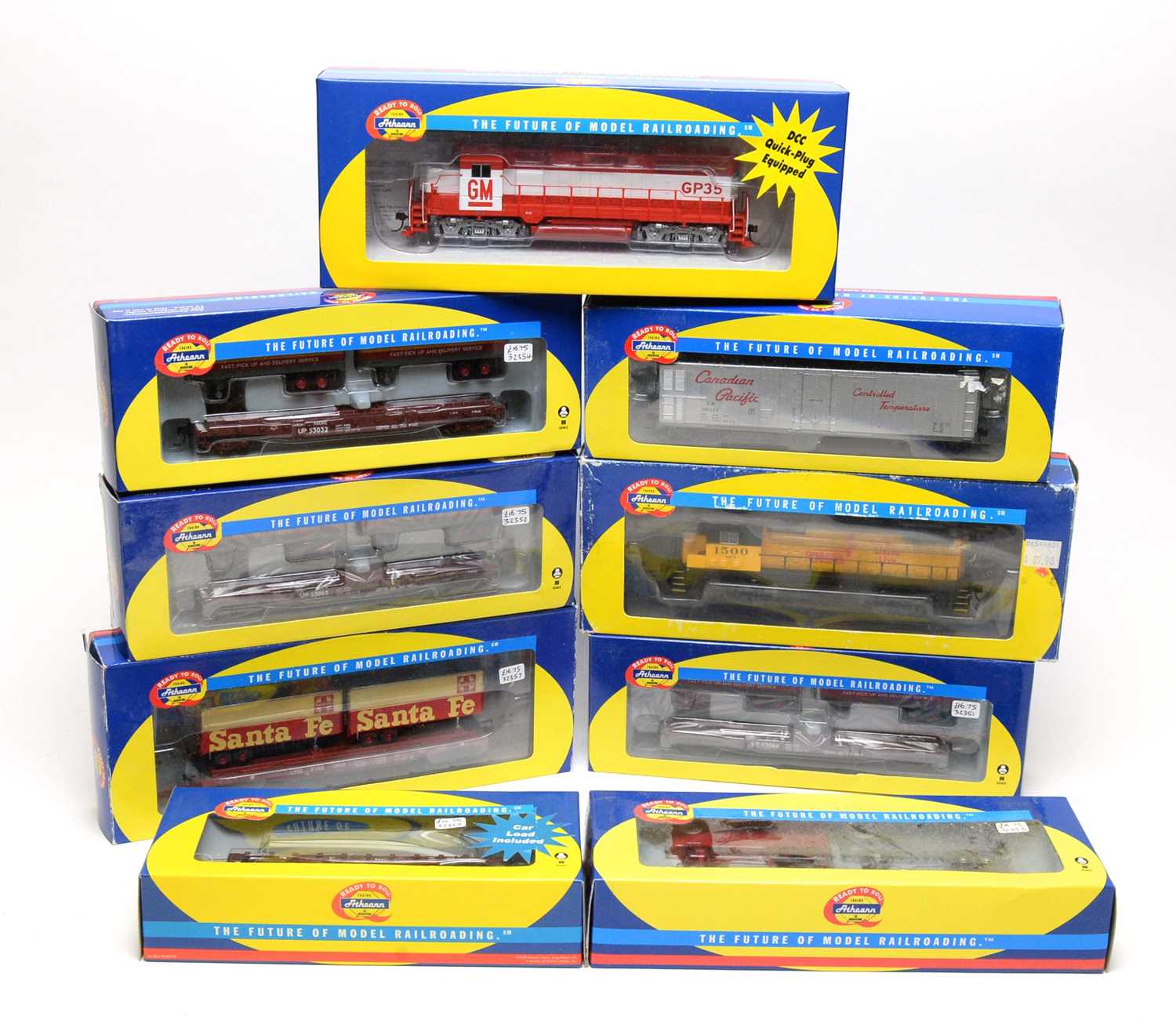 Lot 657 - Nine Athearn trains and rolling stock.