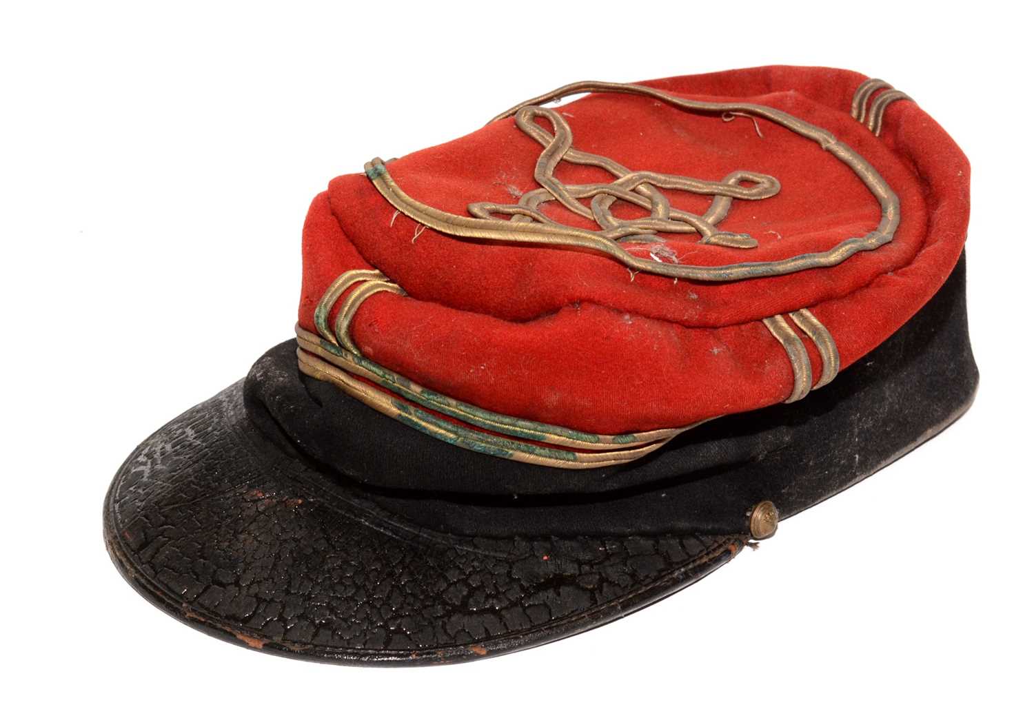 Lot 1062 - A late 19th/early 20th Century French Grenadier's Kepi