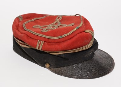 Lot 1062 - A late 19th/early 20th Century French Grenadier's Kepi