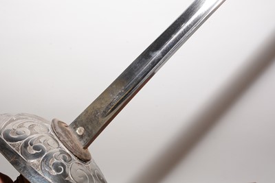 Lot 1069 - WWI Cavalry Officer's sword, 1912 pattern, and effects
