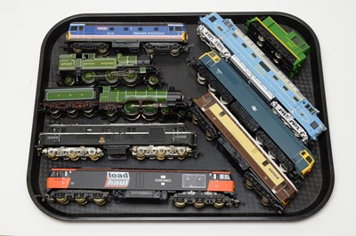 Lot 724 - Nine unboxed trains, various makers.