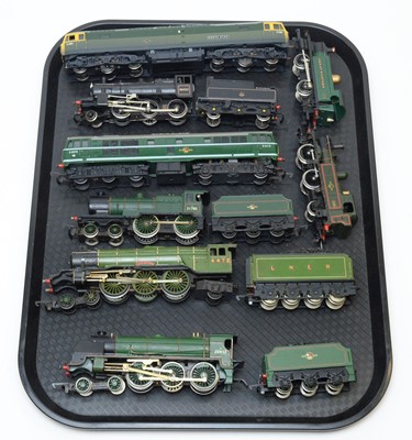Lot 775 - Eight 00-gauge unboxed trains and tenders.