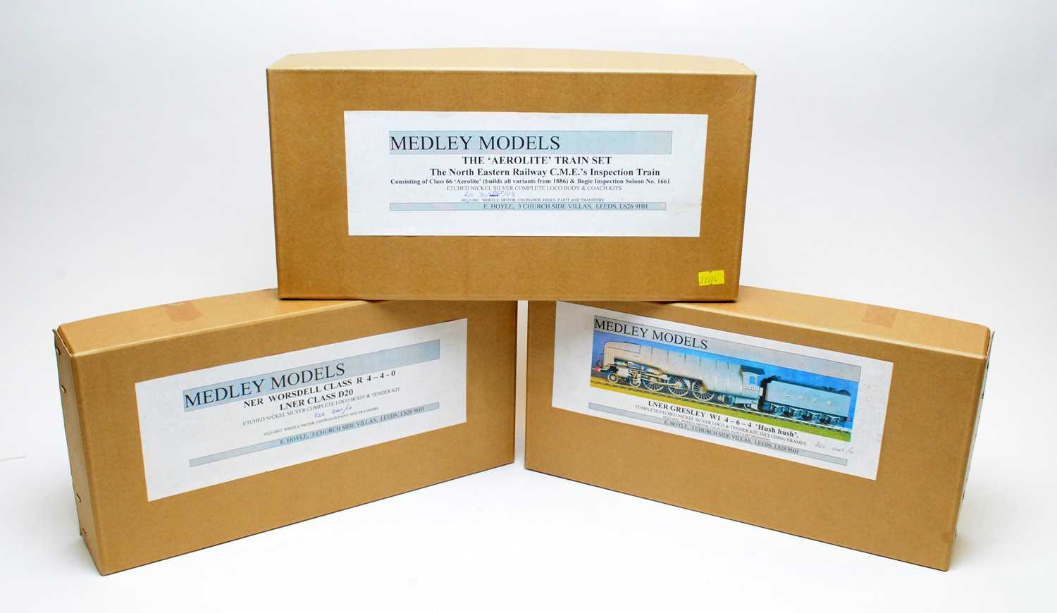 Lot 784 - Three boxed Medley model train kits.