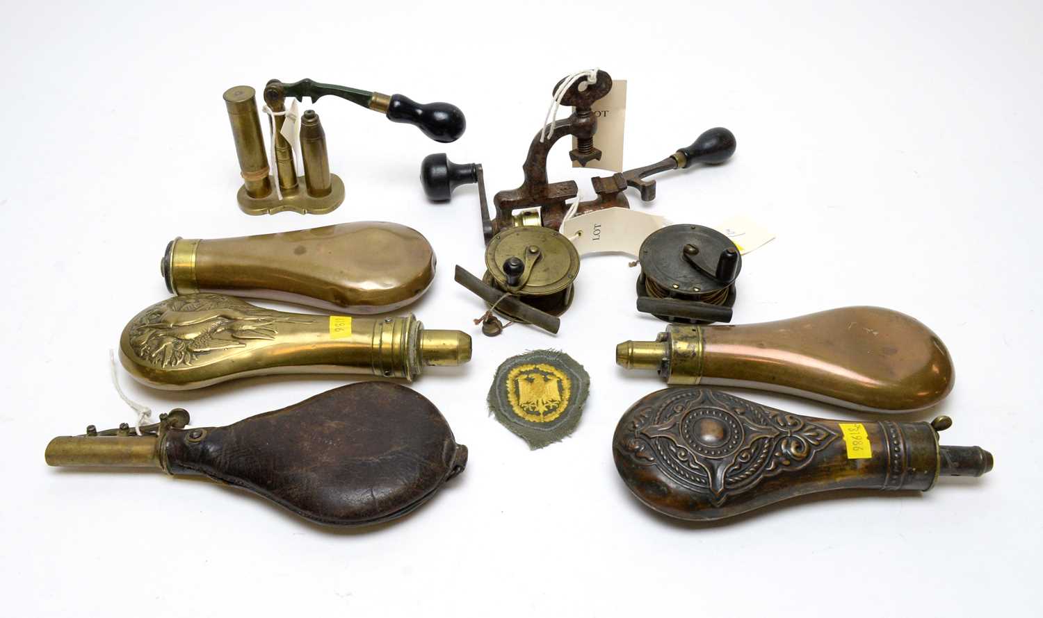 Lot 1083 - 19th Century powder and shot flasks, and two fishing reels.