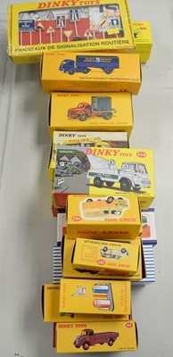 Lot 893 - A collection of reproduction Dinky Toys diecast scale model vehicles.