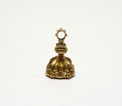 Lot 22 - A 19th Century yellow metal and citrine fob seal.