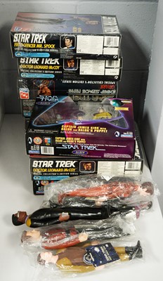 Lot 934 - Boxed and packaged Star Trek action figures.