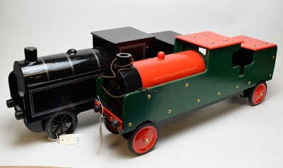 Lot 940 - Two scratch-built wooden locomotives on wheels.