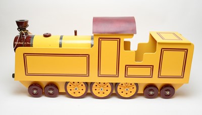 Lot 943 - A scratch-built sit-on wooden locomotive with wheels.