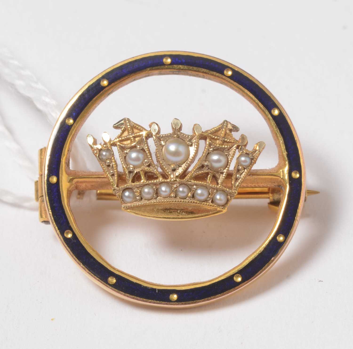 Lot 269 - A 9ct gold, split seed-pearl and enamel Royal Navy sweetheart brooch.