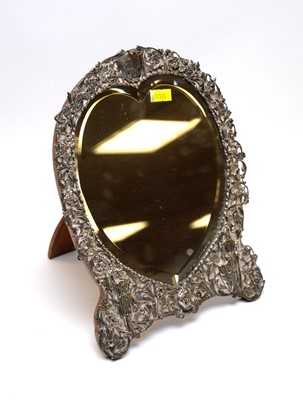 Lot 42 - A Victorian silver framed dressing table mirror.