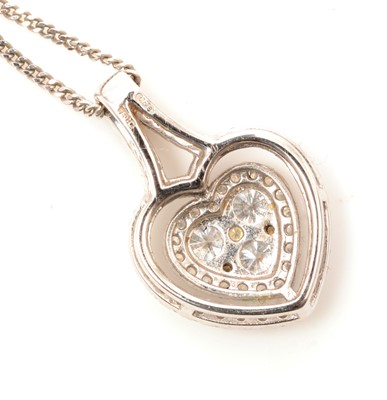 Lot 87 - A diamond set heart shaped pendant