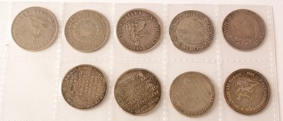 Lot 201 - Nine silver shilling tokens