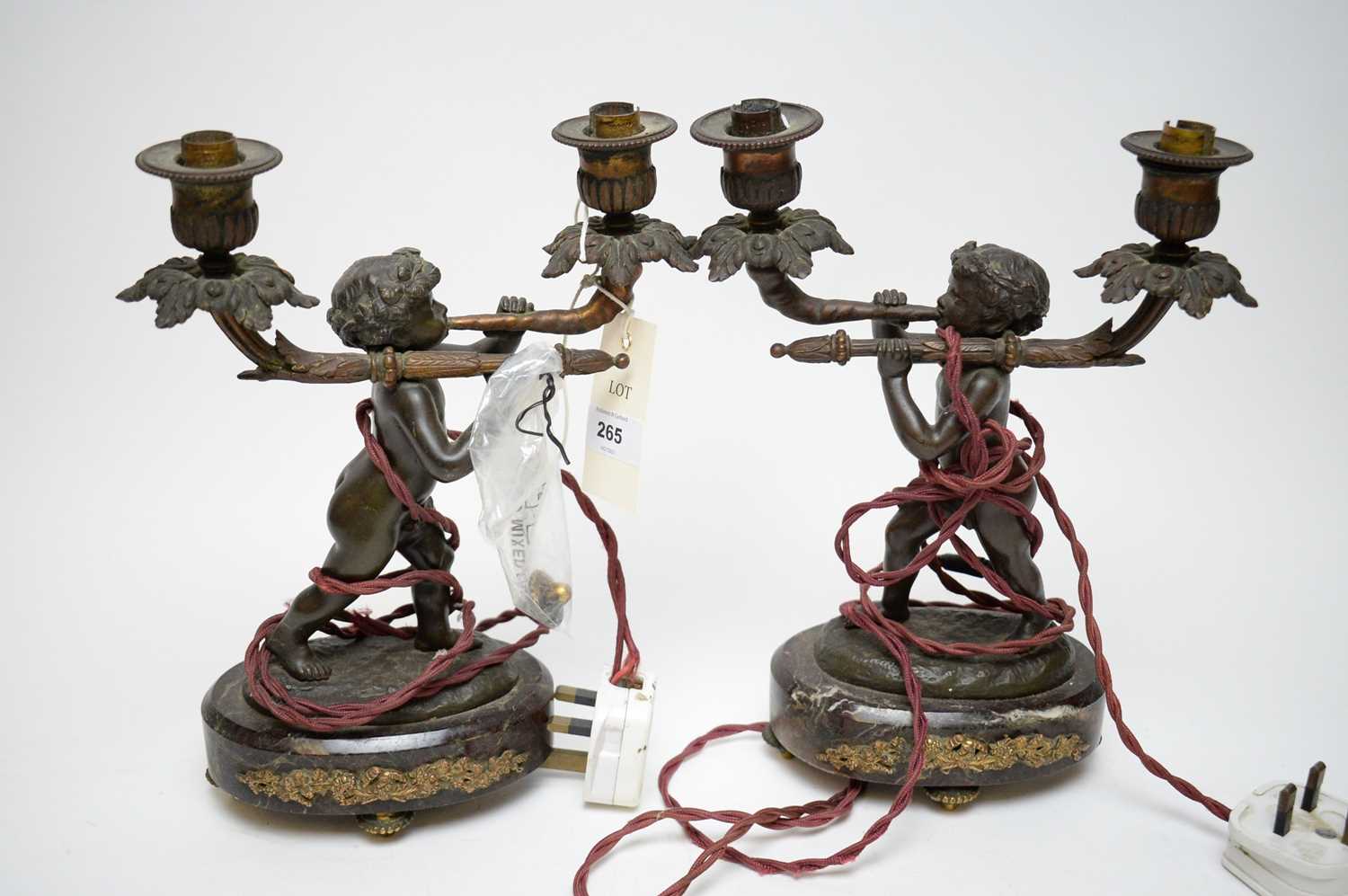 Lot 265 - Pair of bronzed two-branch figural table lamps