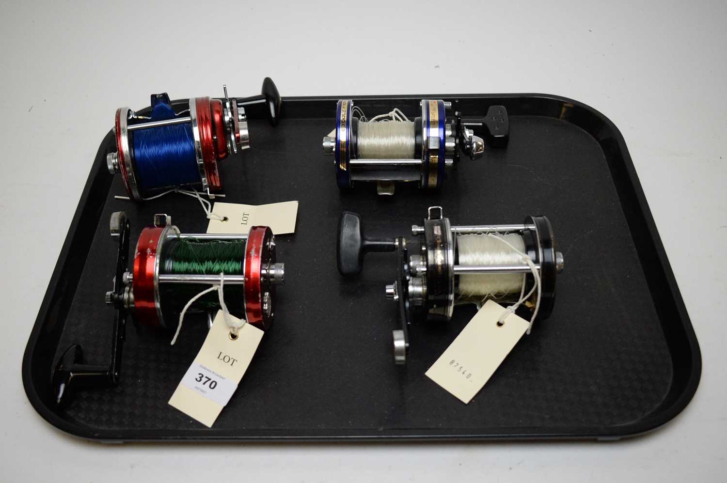 Lot 370 - Selection of four fishing reels