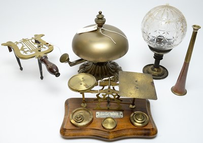 Lot 299 - A late 19th C brass table bell, and other brass items