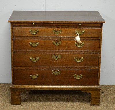 Lot 18 - A George III oak chest of drawers.