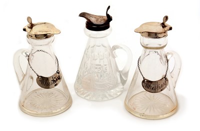 Lot 172 - Three silver mounted whisky tots